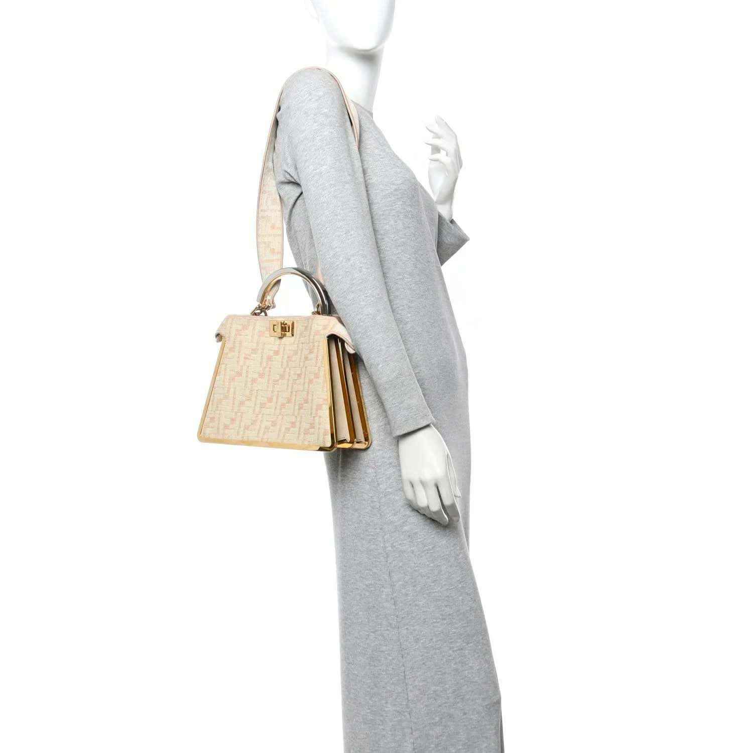 Fendi small Peekaboo satchel bag with light beige FF canvas and gold side hardware, crossbody strap