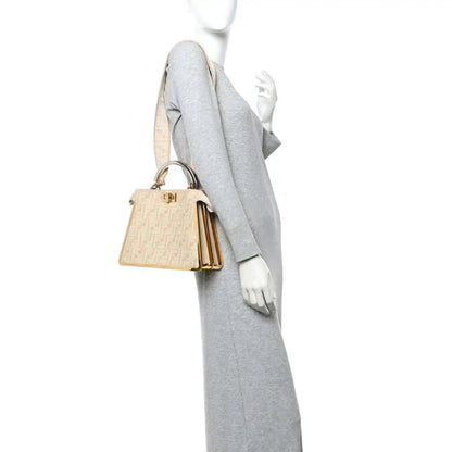 Fendi small Peekaboo satchel bag with light beige FF canvas and gold side hardware, crossbody strap