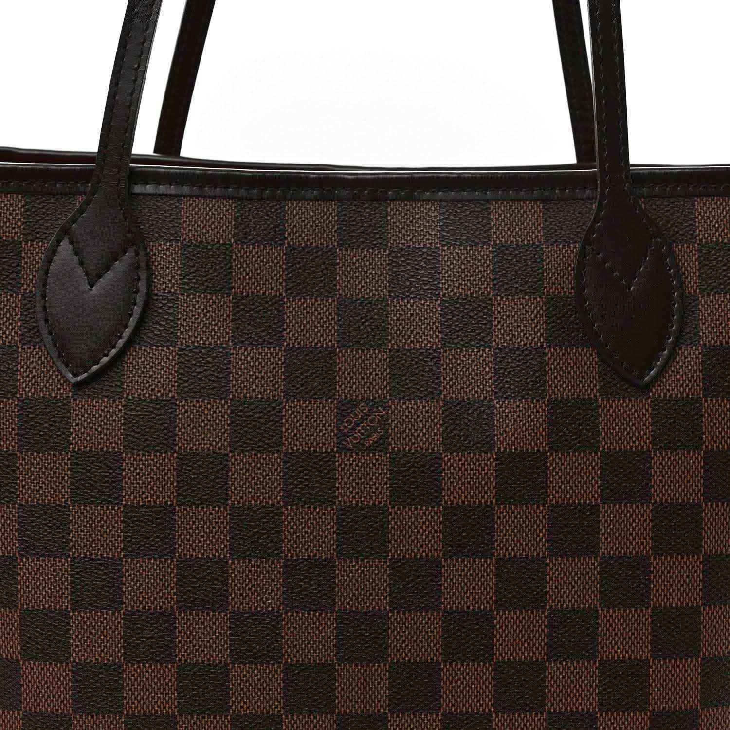 Damier Ebene tote bag close-up of brown check canvas and leather handle