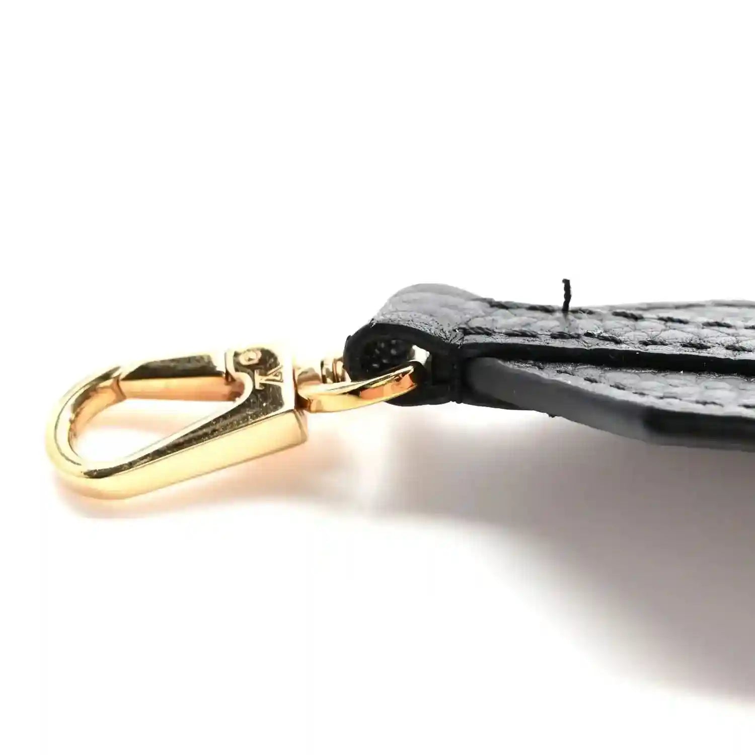 Mini handbag strap end with gold lobster clasp, black leather