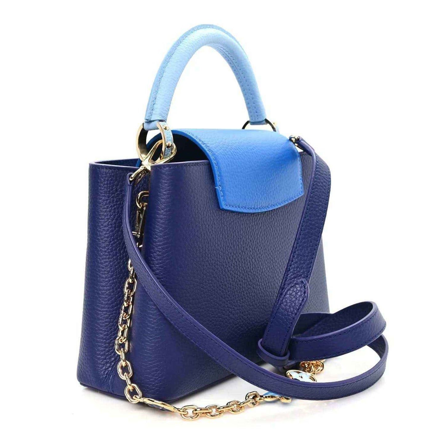Blue pebbled leather handbag with light blue top handle and leather shoulder strap