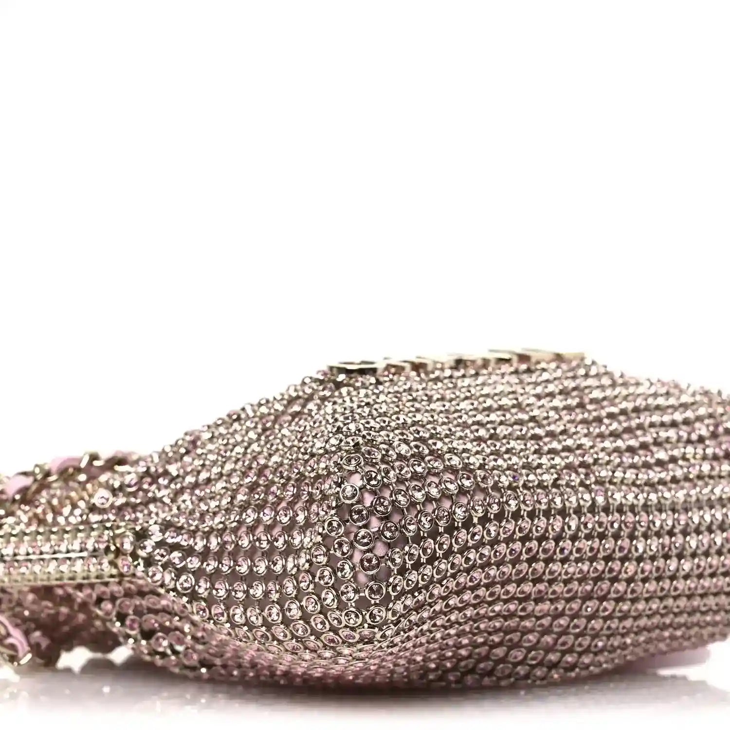 Chanel Mini 22 handbag side profile with dense crystal mesh and short chain edge.