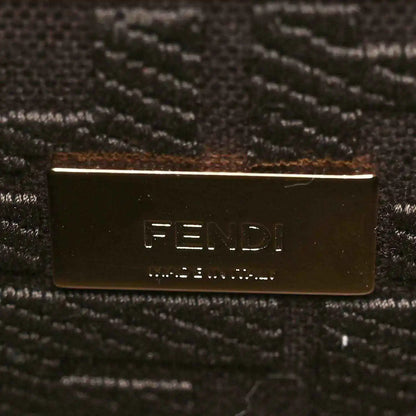 Fendi logo plate on dark brown fabric lining.