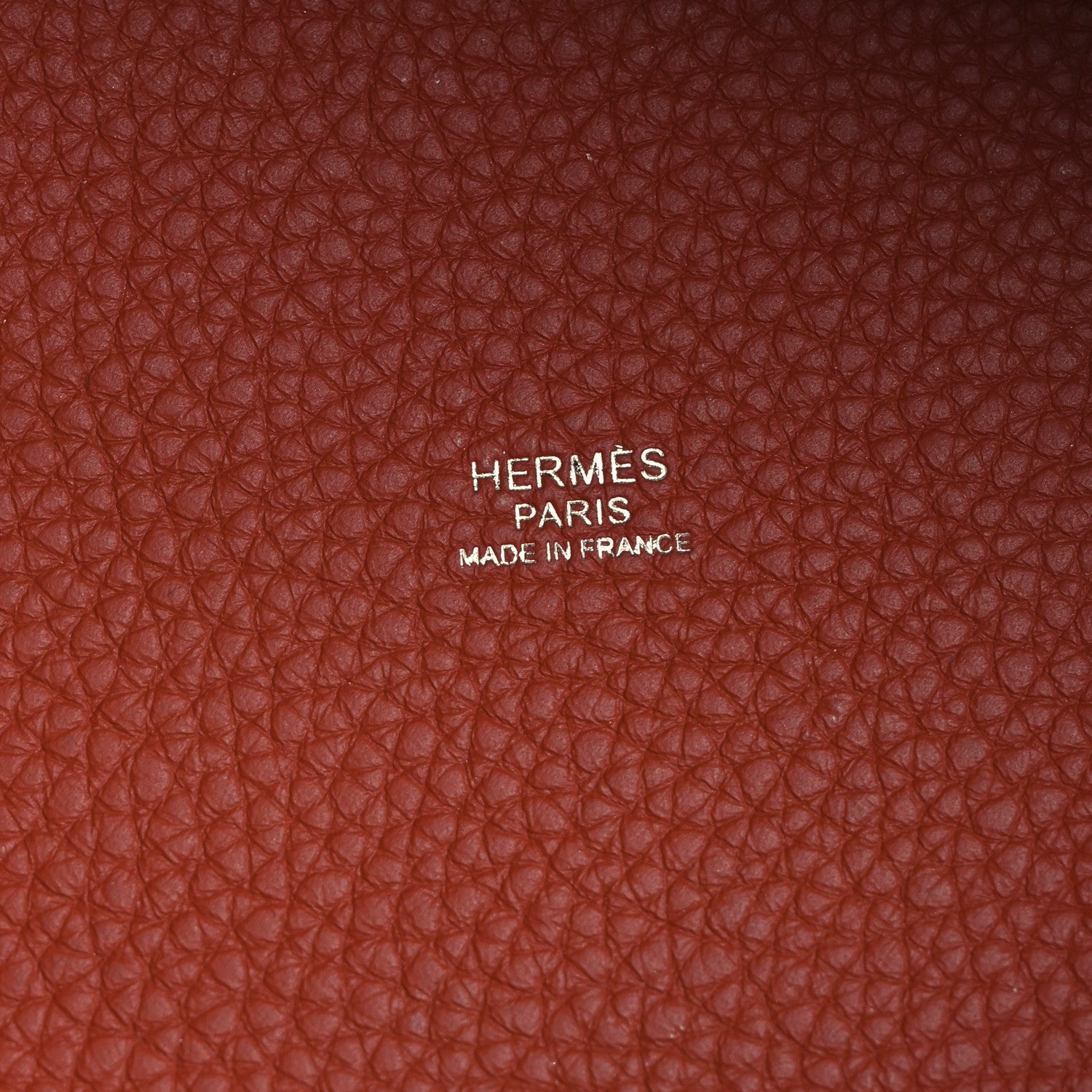 Red-brown leather lining with embossed HERMES PARIS and MADE IN FRANCE
