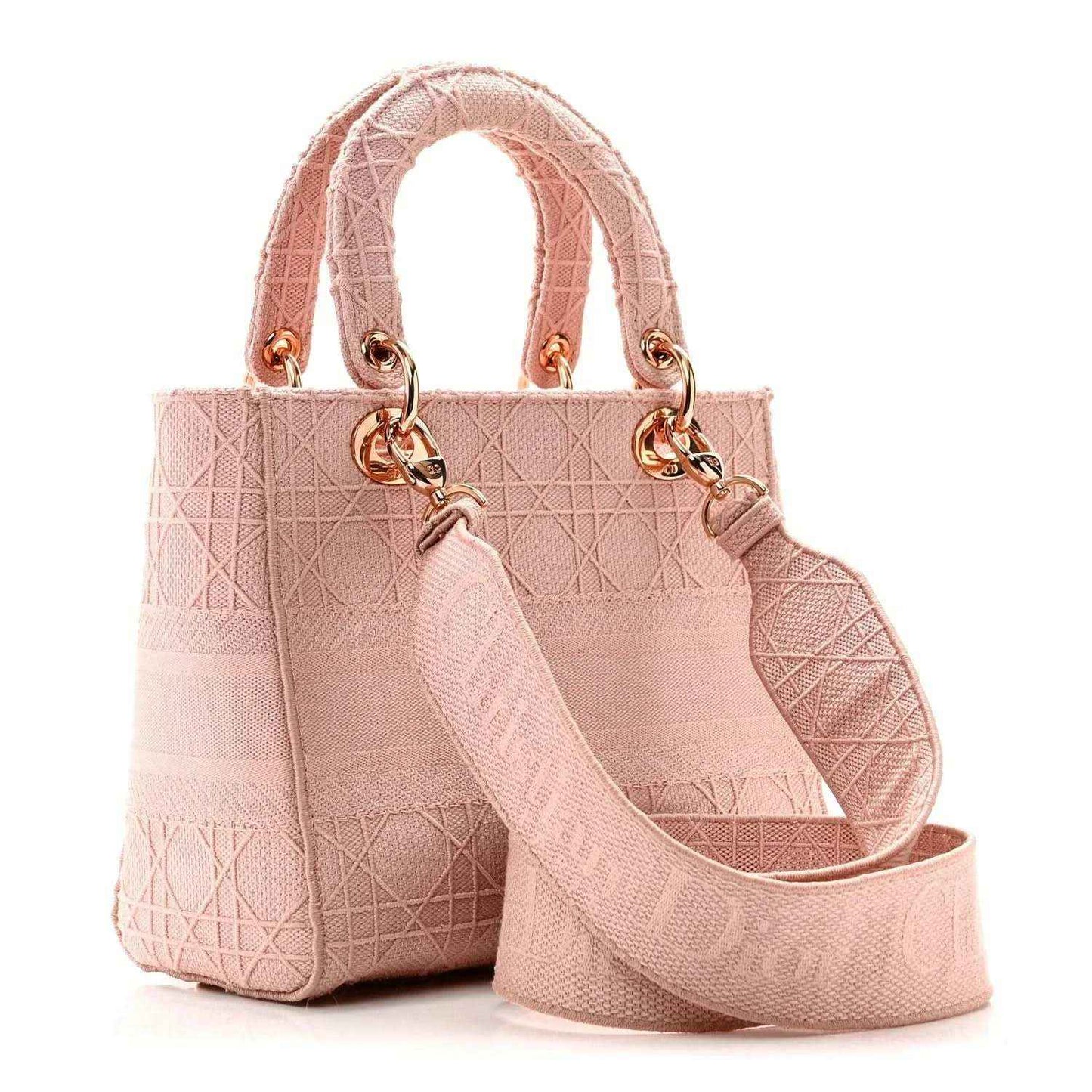 Medium pink canvas bag with top handles, shoulder strap, and gold monogram charm