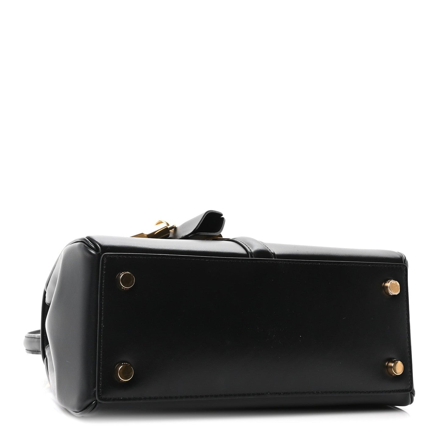 Celine mini top-handle bag side view in black leather with gold hardware snaps