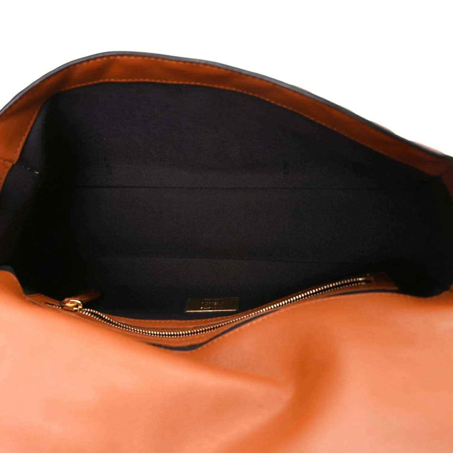 Fendi baguette bag interior view with zippered opening and black lining