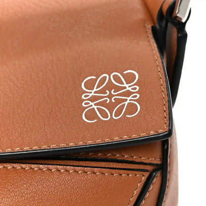 Loewe tan calfskin small Puzzle shoulder bag flap with white Loewe anagram logo