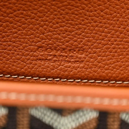 Belvedere II PM messenger bag close-up of brown leather texture with Goyard stamp