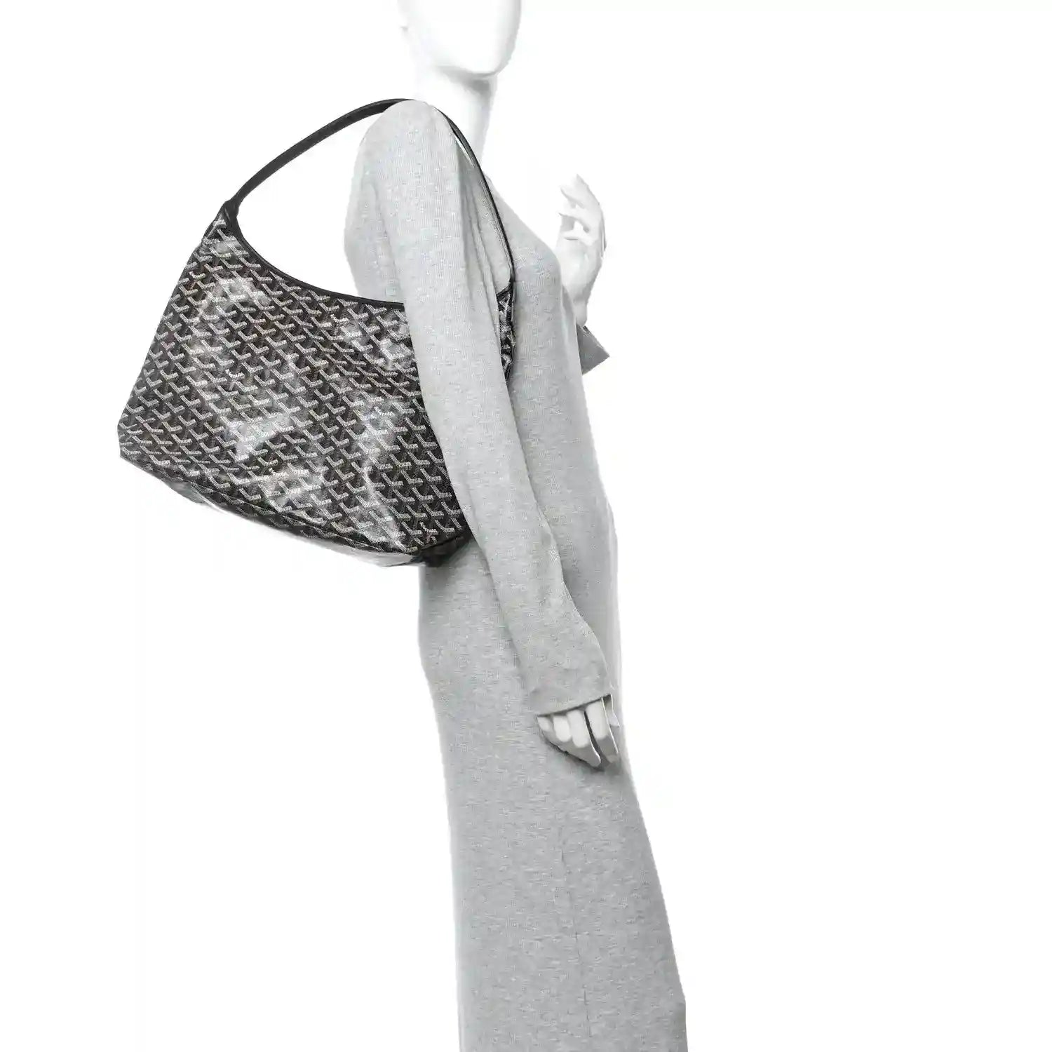Goyard hobo bag shown in side view with black coated canvas and curved top handle
