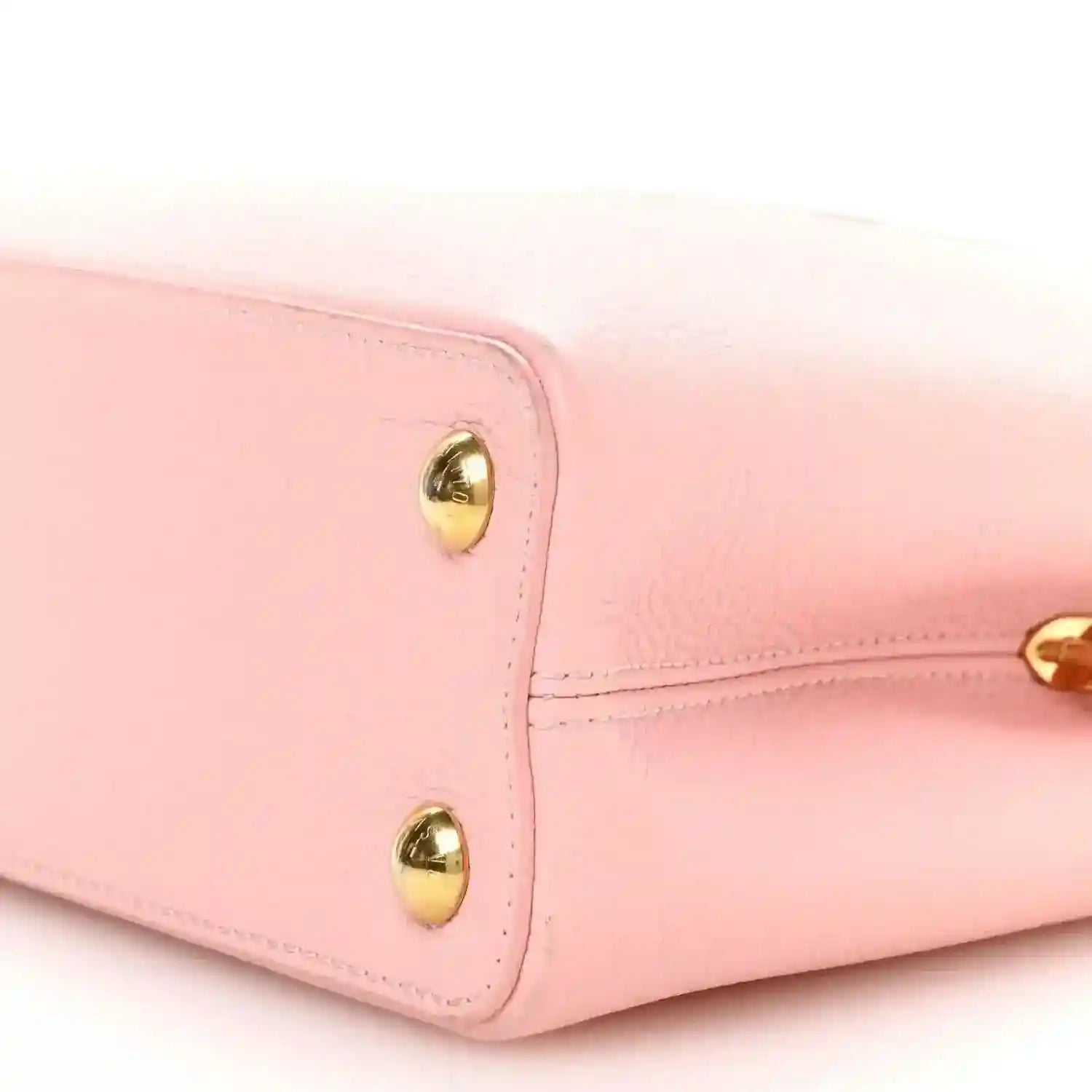 Bubble gum pink leather Capucines BB bag side panel with gold stud hardware