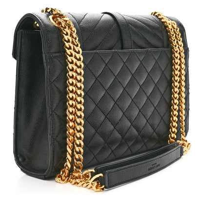 Black quilted satchel bag with gold chain shoulder strap and flap closure