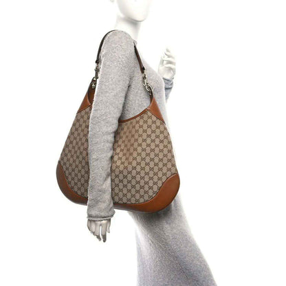 Brown GG monogram canvas shoulder bag with leather trim and chain-link strap