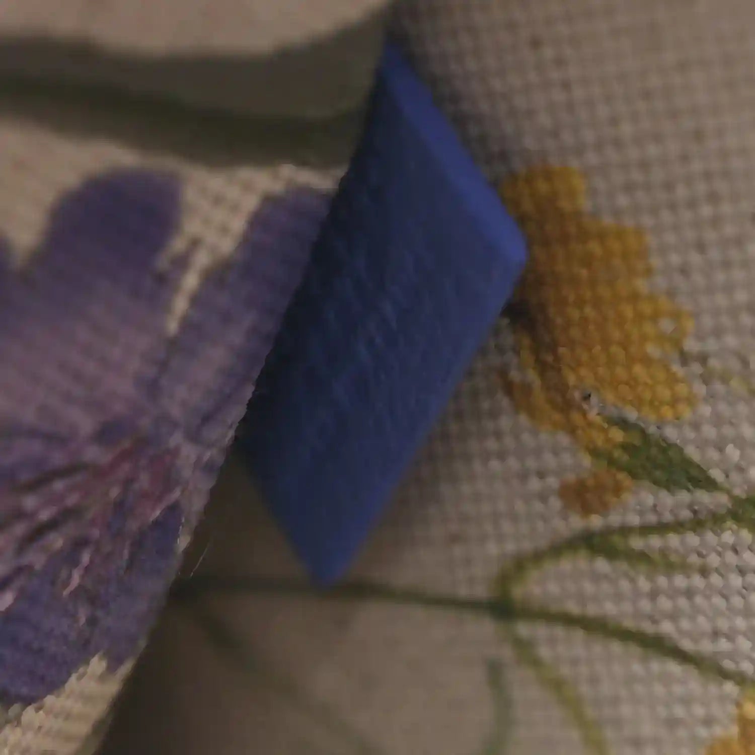 Close-up of Goyardine Villette PM tote bag strap and blue coated canvas pattern
