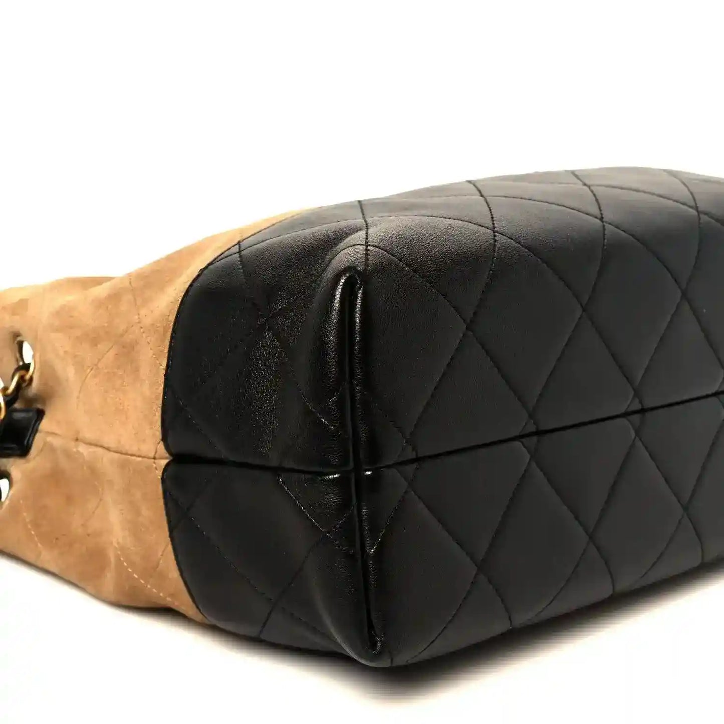 Black quilted small shopping bag section with beige suede end and chain attachment