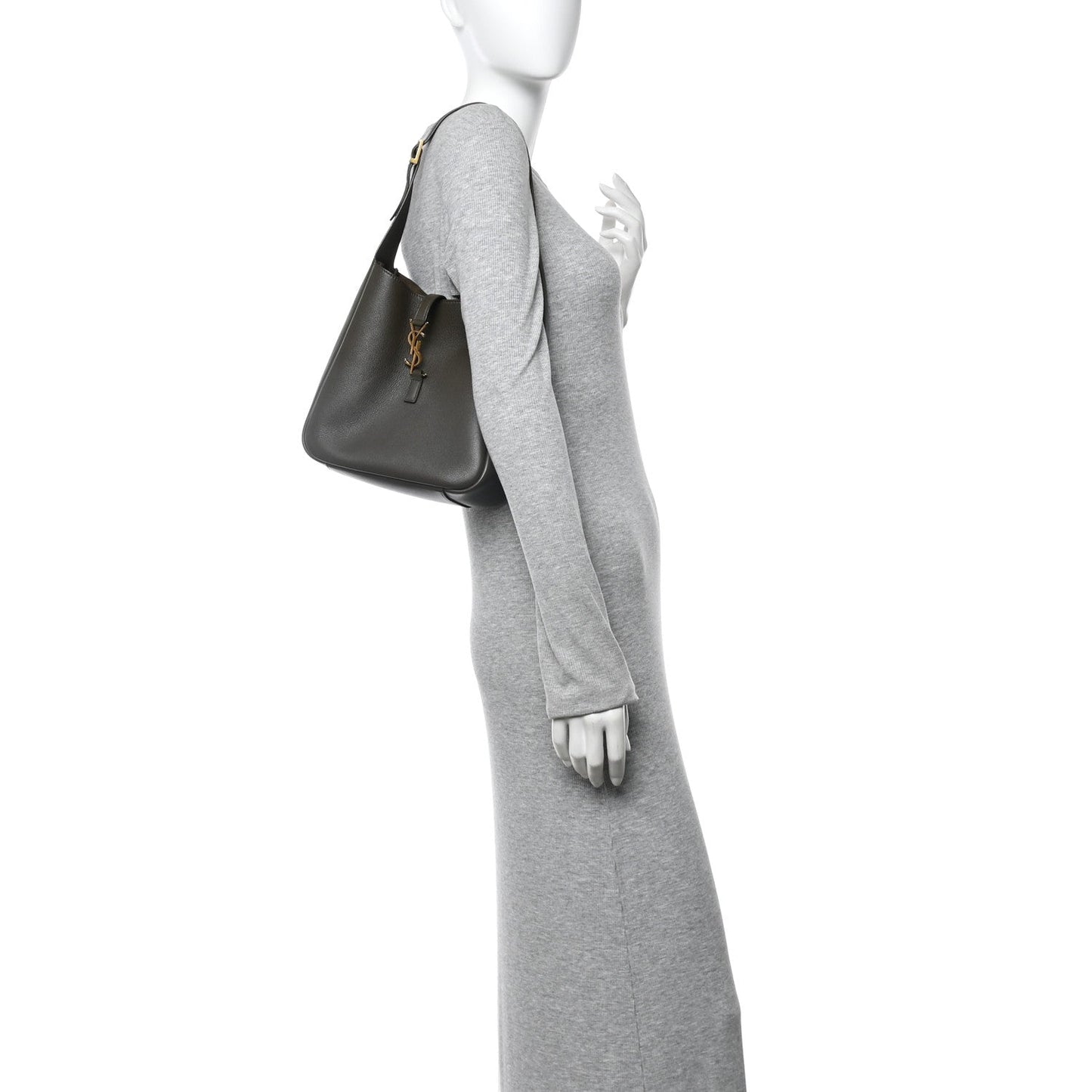 Calfskin hobo bag with top handle, carried over a sleeve on a mannequin.