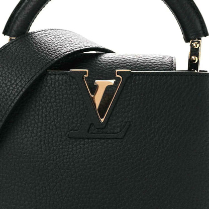 Louis Vuitton black leather mini handbag with LV logo front clasp