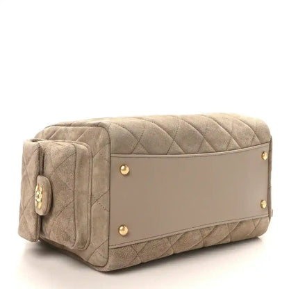 Chanel dark grey quilted suede bowling bag with gold front panel and snap tabs
