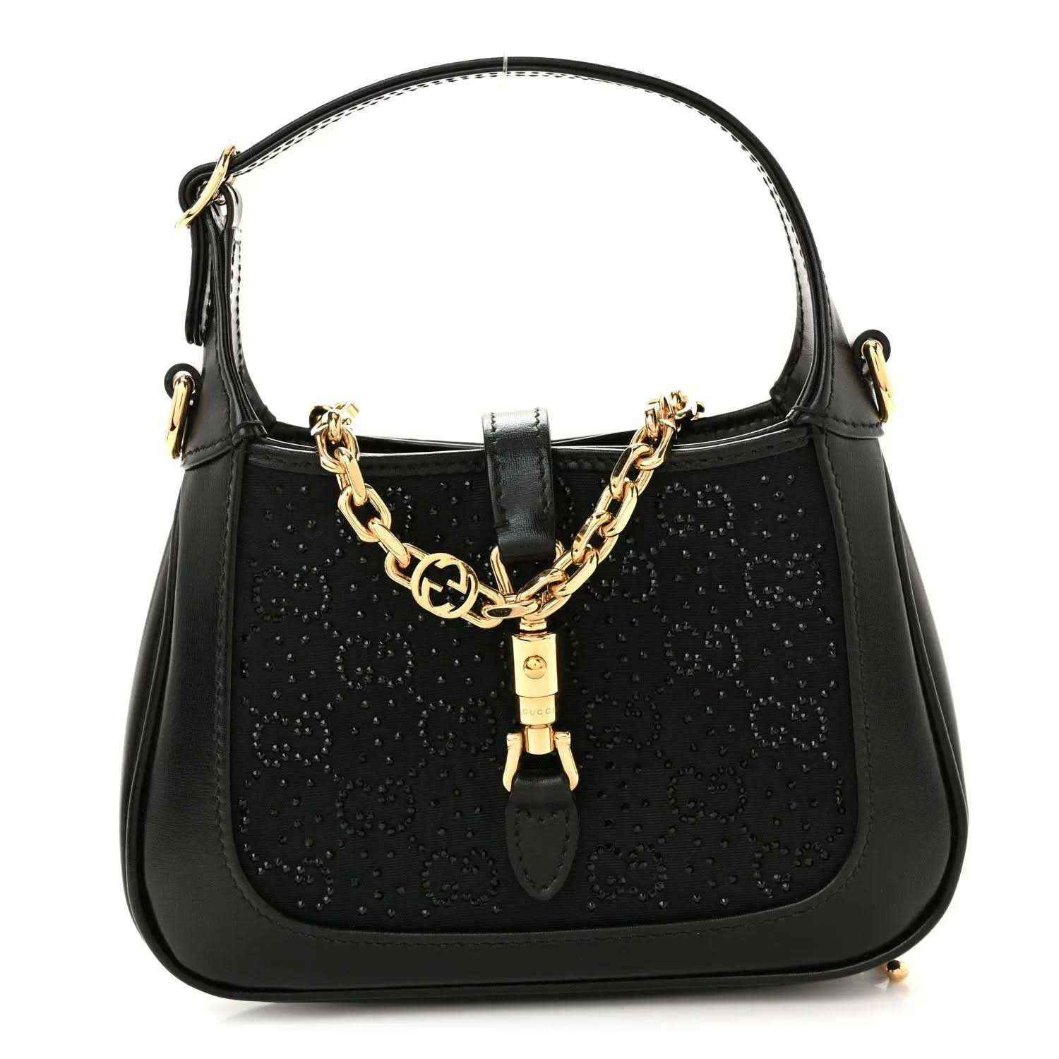 Black hobo bag with top handle, gold chain detail, and leather clasp accent.