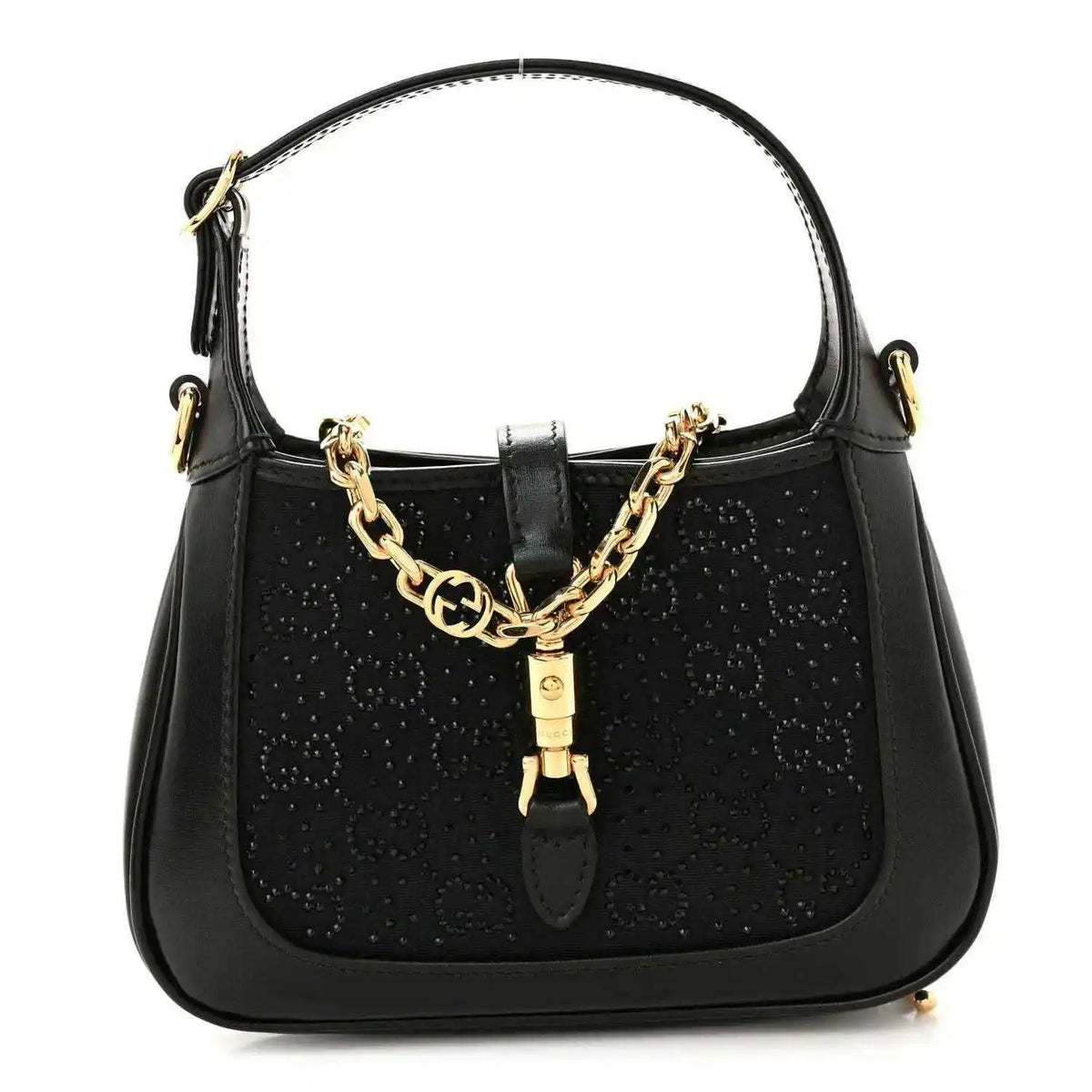 Black hobo bag with top handle, gold chain detail, and leather clasp accent.