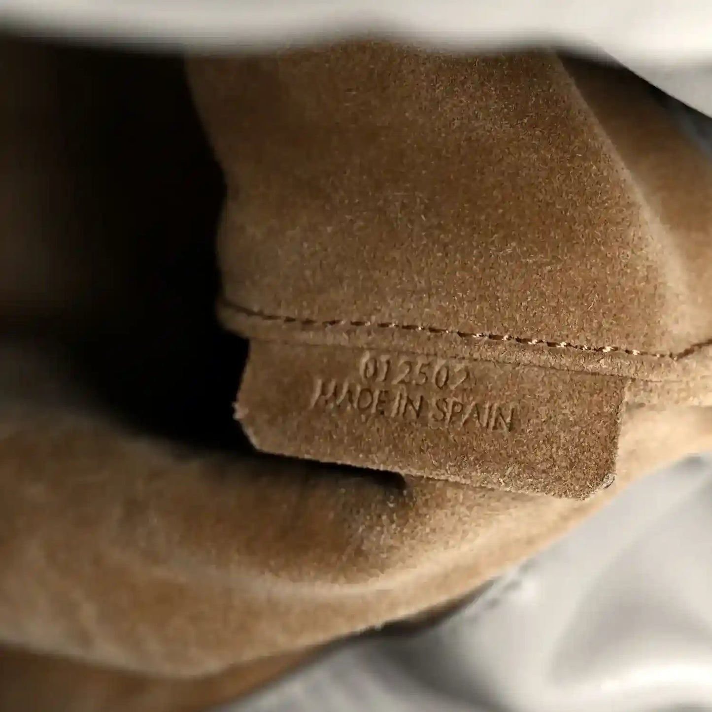 Loewe interior leather stamp with "Made in Spain" text near the base