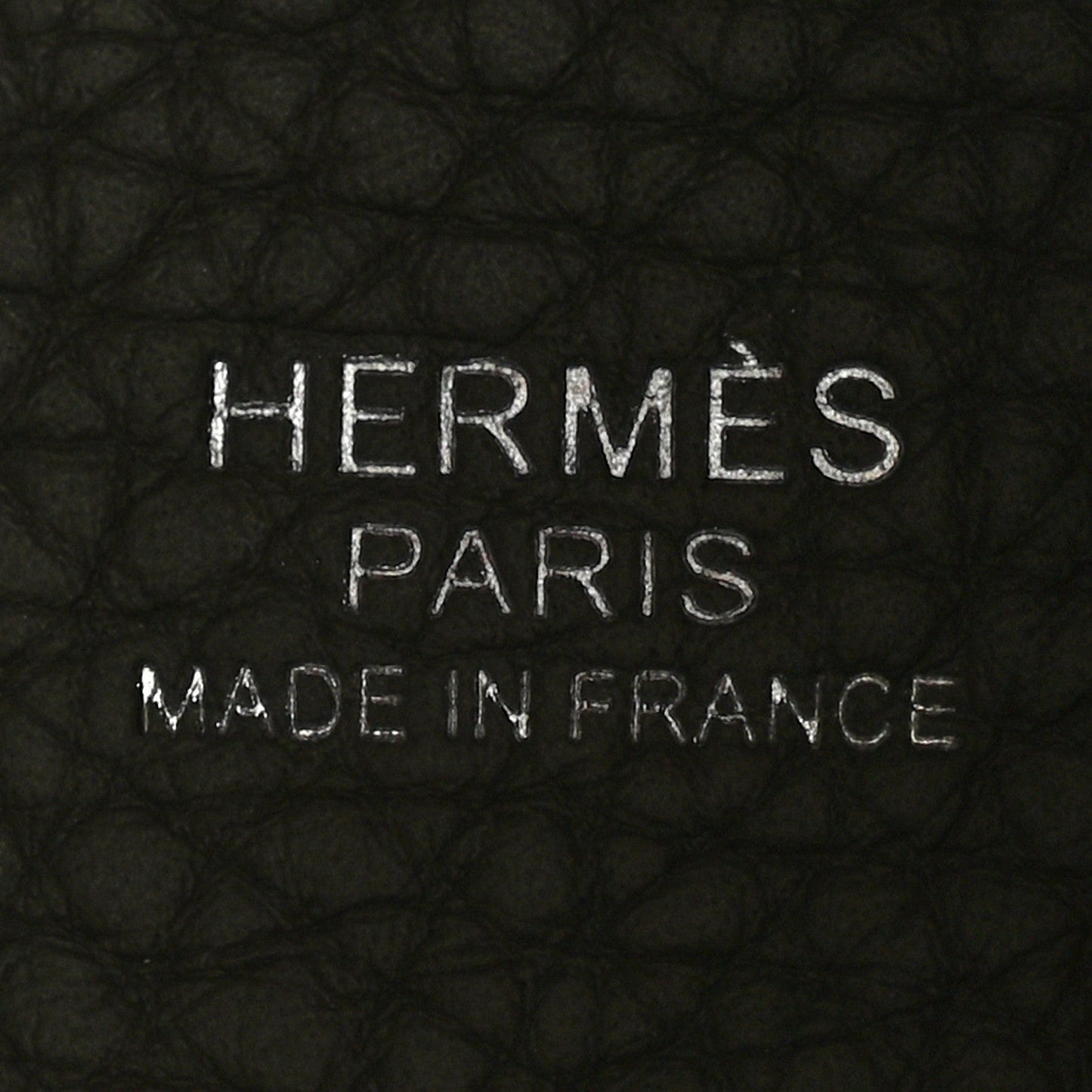 Leather bucket bag interior branding stamp: HERMES PARIS MADE IN FRANCE