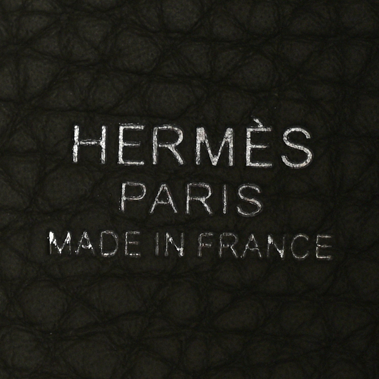 Leather bucket bag interior branding stamp: HERMES PARIS MADE IN FRANCE