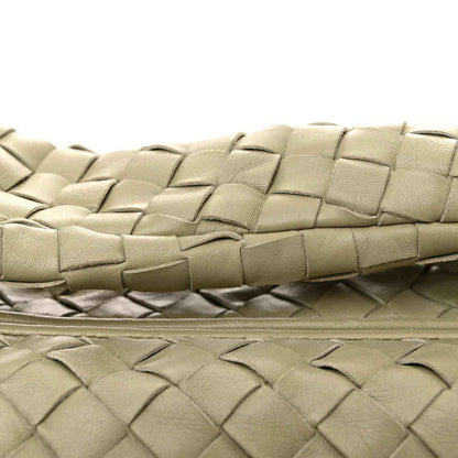 Small woven lambskin leather bag in light travertine tone, close-knit braided weave