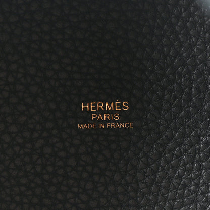 Black leather tote bag logo embossing with “HERMES PARIS MADE IN FRANCE”