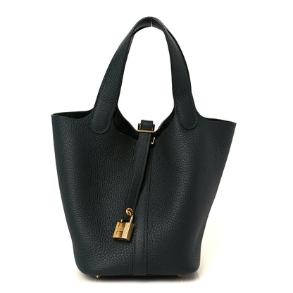 Dark green leather tote bag with top handles and central gold-tone lock detail