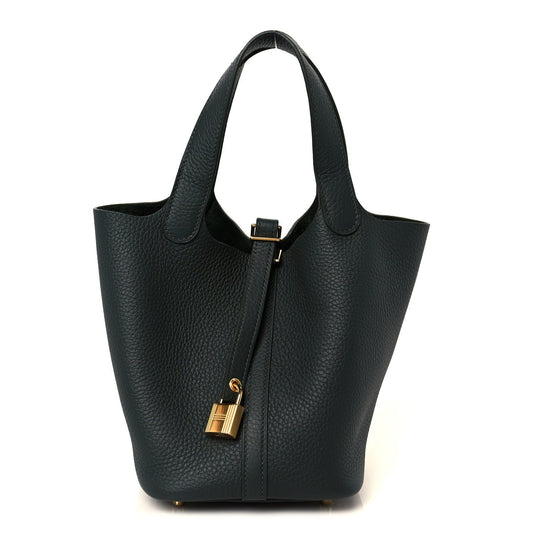 Dark green leather tote bag with top handles and central gold-tone lock detail