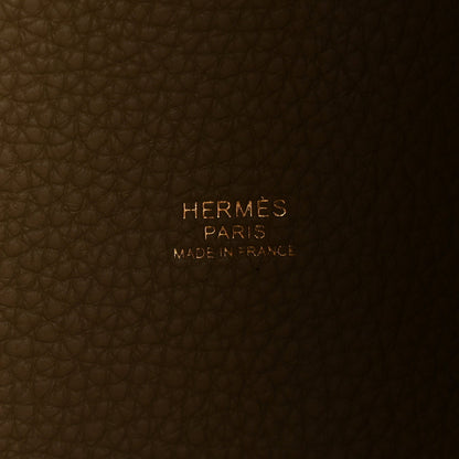 Beige leather tote interior with embossed HERMES PARIS and Made in France text