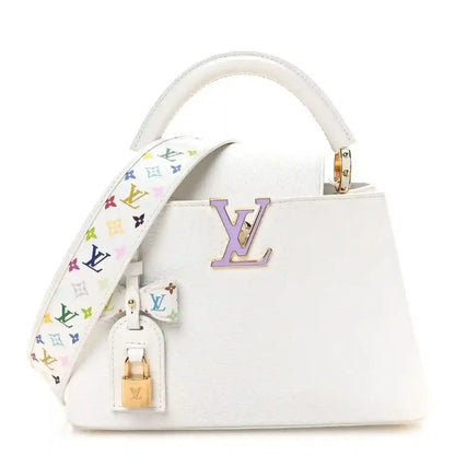 White leather handbag with multicolor monogram strap and gold-tone top handles