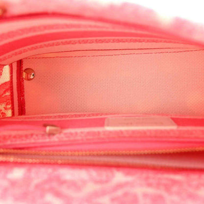 Pink fabric bag interior with zip closure and pink lining