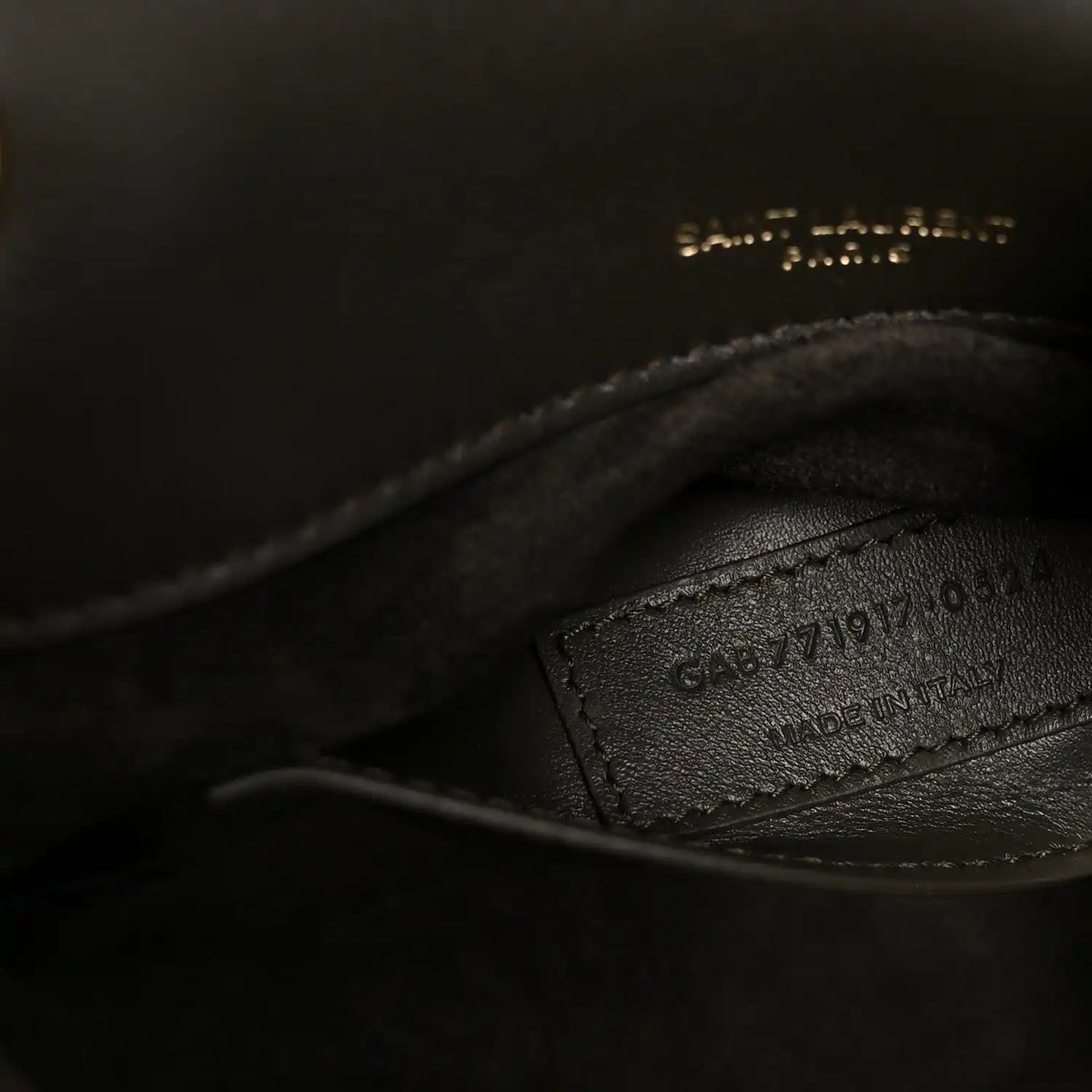 Leather interior stamp text on dark lining