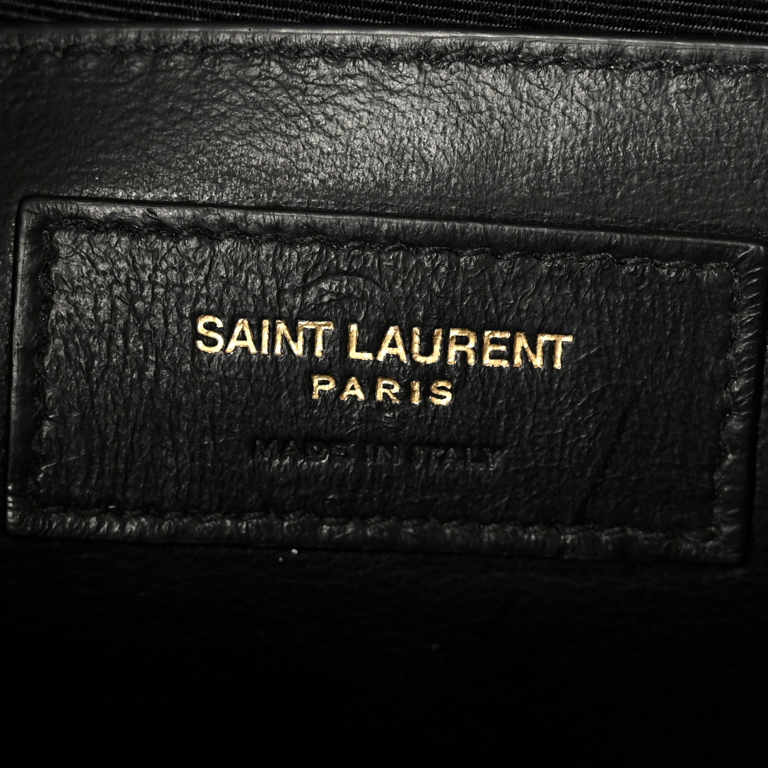 Saint Laurent Paris logo on black leather label