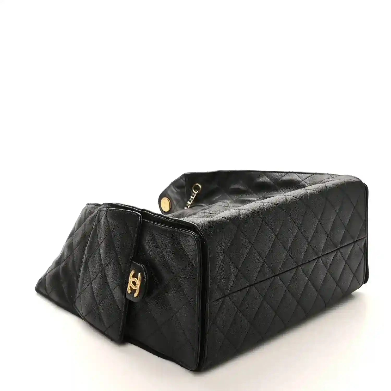 Black Chanel medium quilted leather handbag with gold-tone CC clasp and side flap
