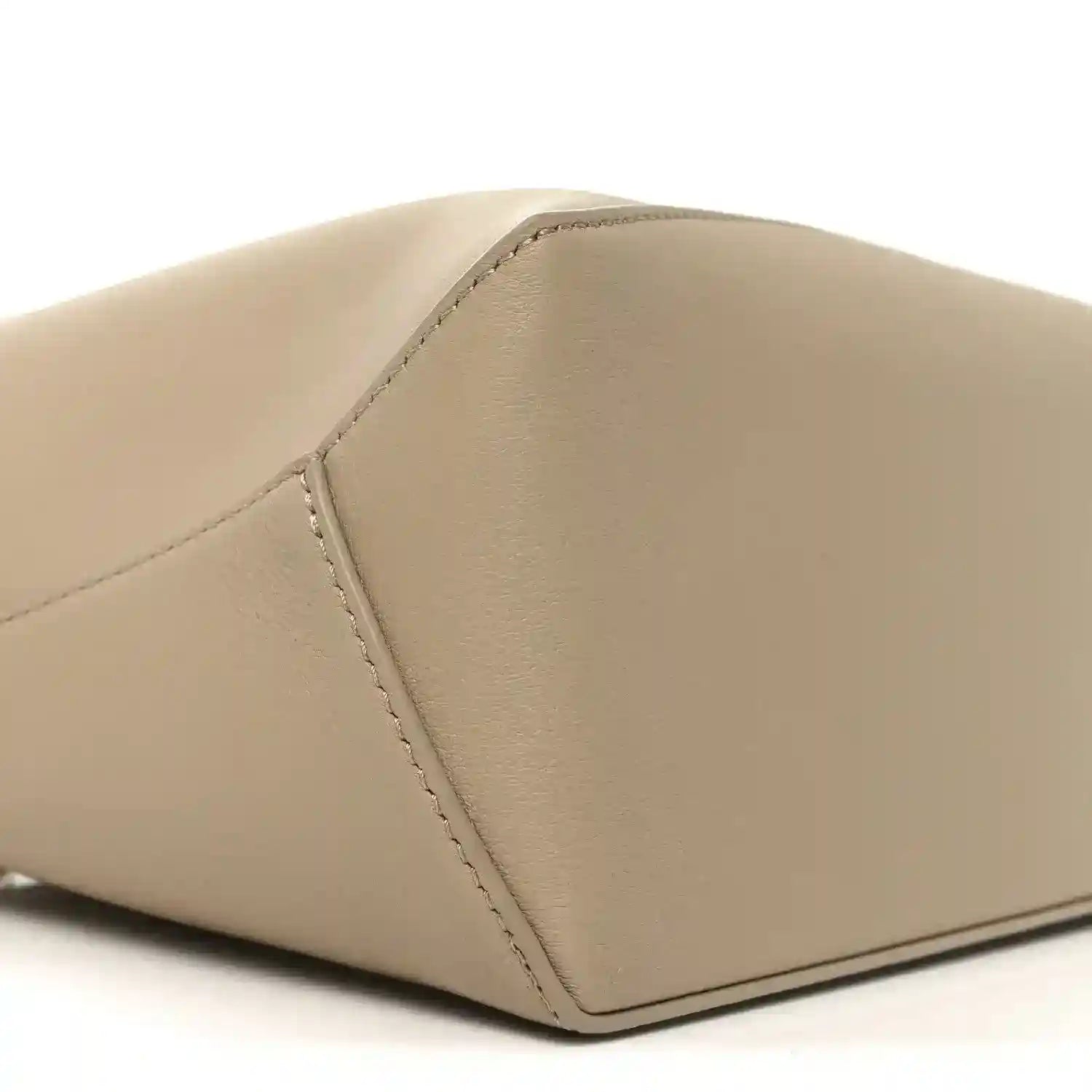 Small Puzzle edge bag corner detail, smooth beige calfskin with edge stitching