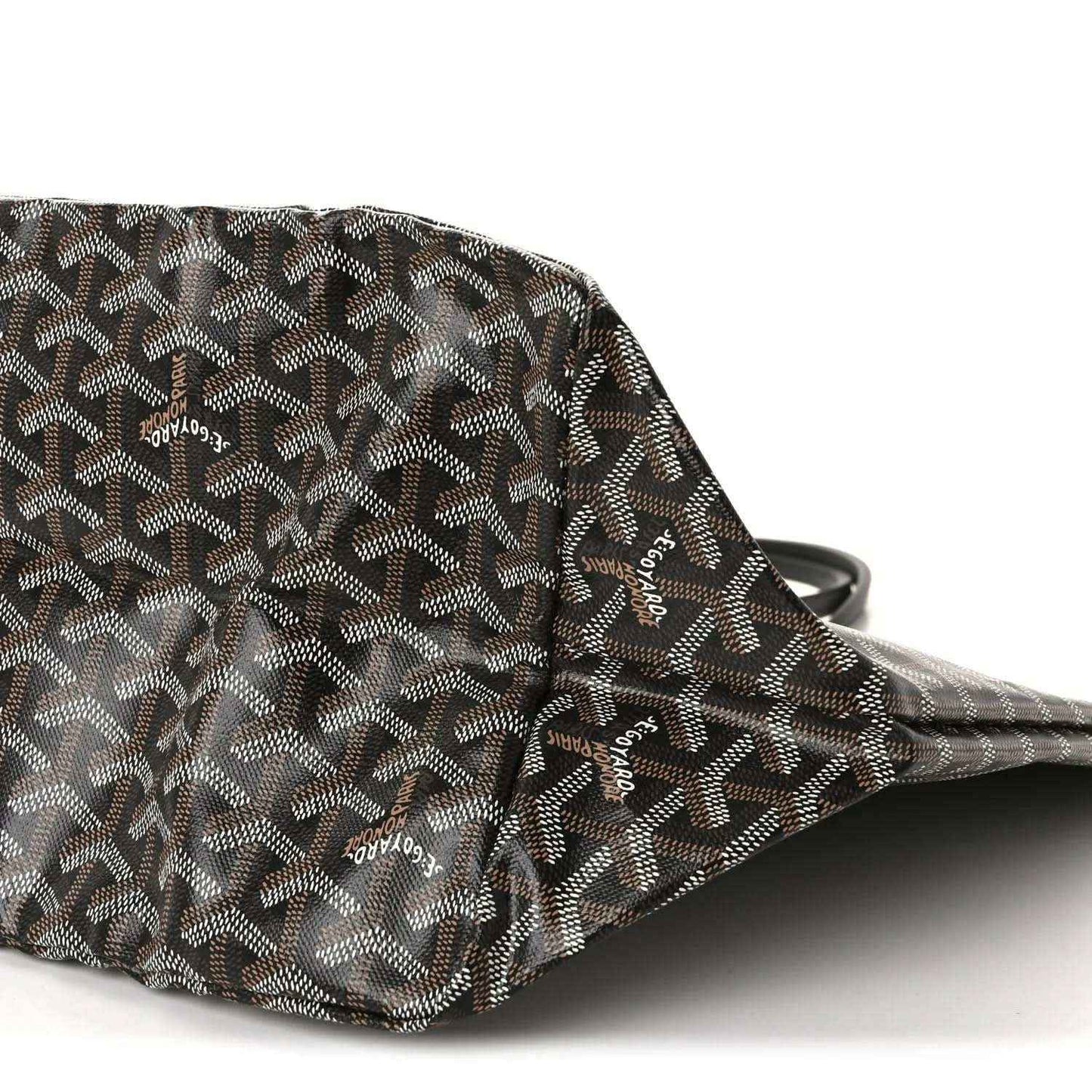 Goyardine tote bag corner with monogram pattern and black trim handle