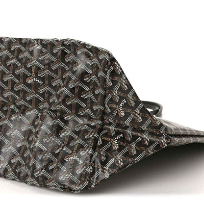 Goyardine tote bag corner with monogram pattern and black trim handle