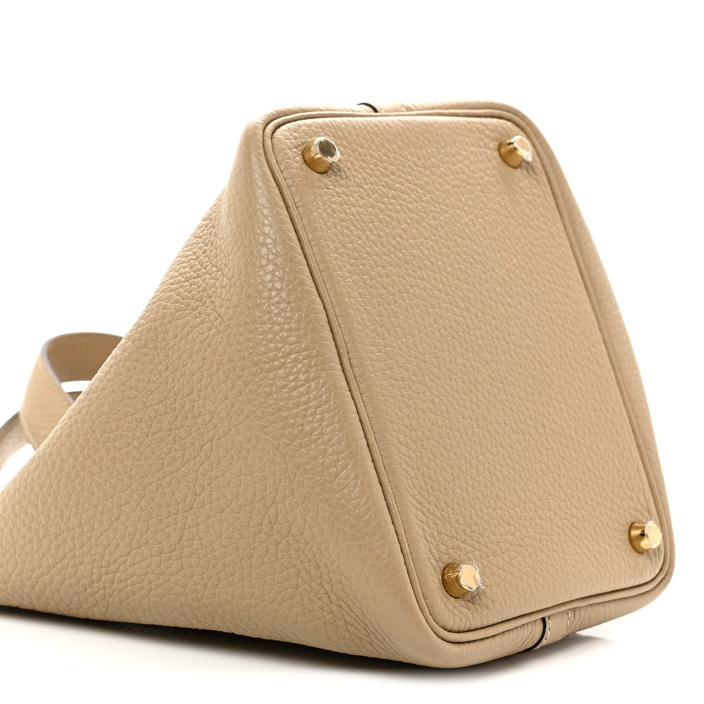 Beige grained calfskin bucket handbag side view with gold corner studs.