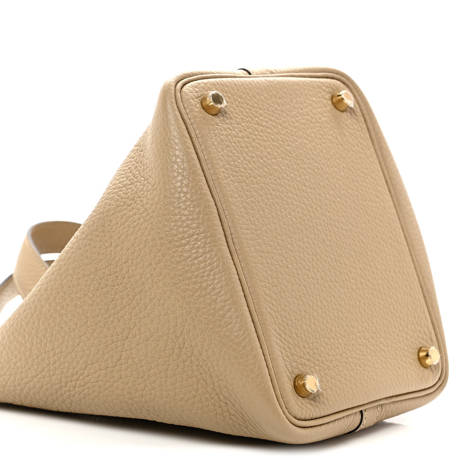 Beige grained calfskin bucket handbag side view with gold corner studs.