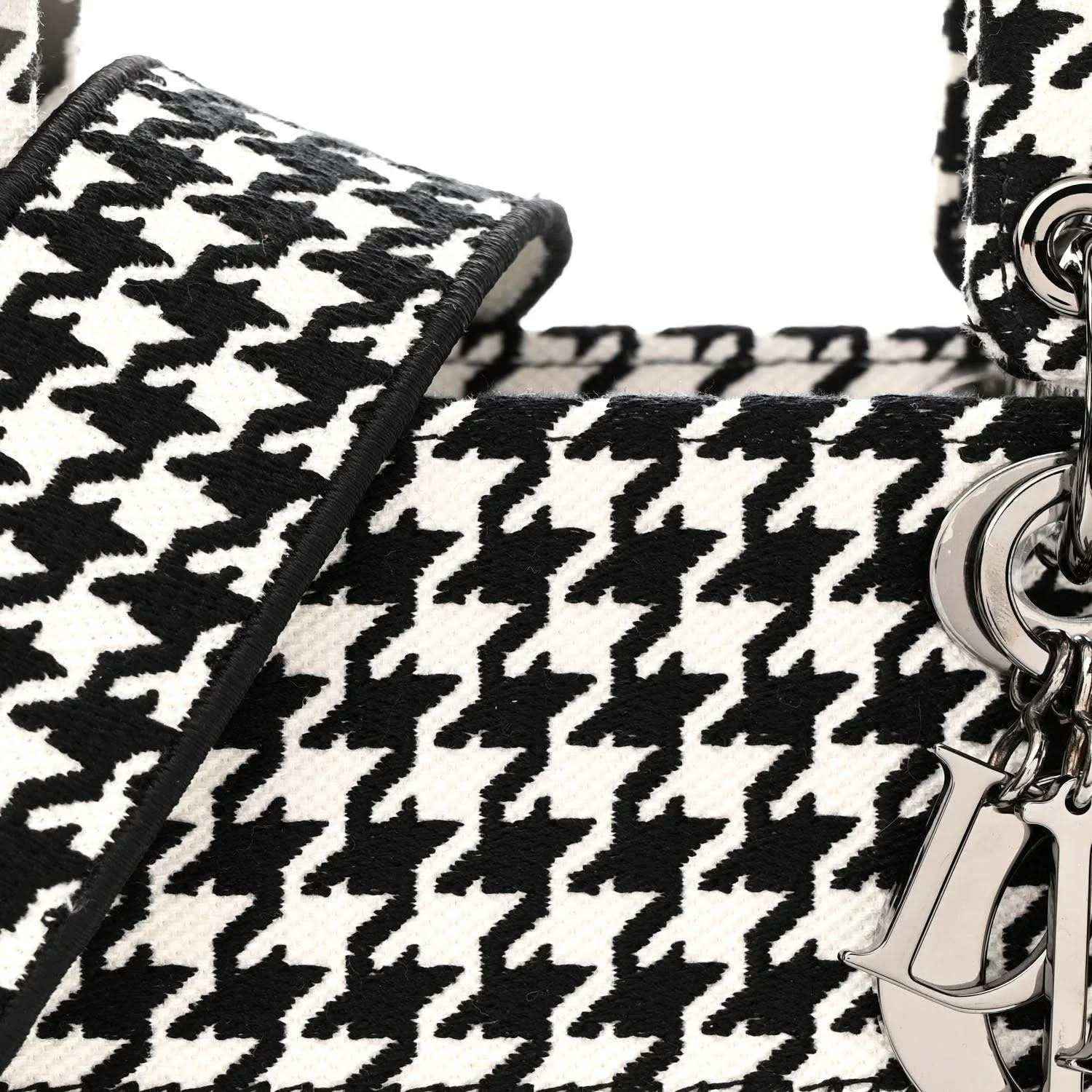 Houndstooth canvas bag corner with silver-tone chain hardware and black strap