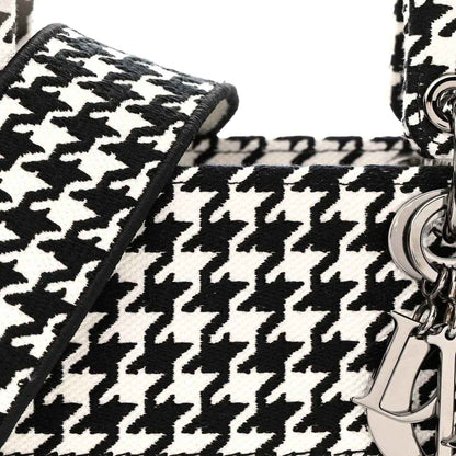 Houndstooth canvas bag corner with silver-tone chain hardware and black strap