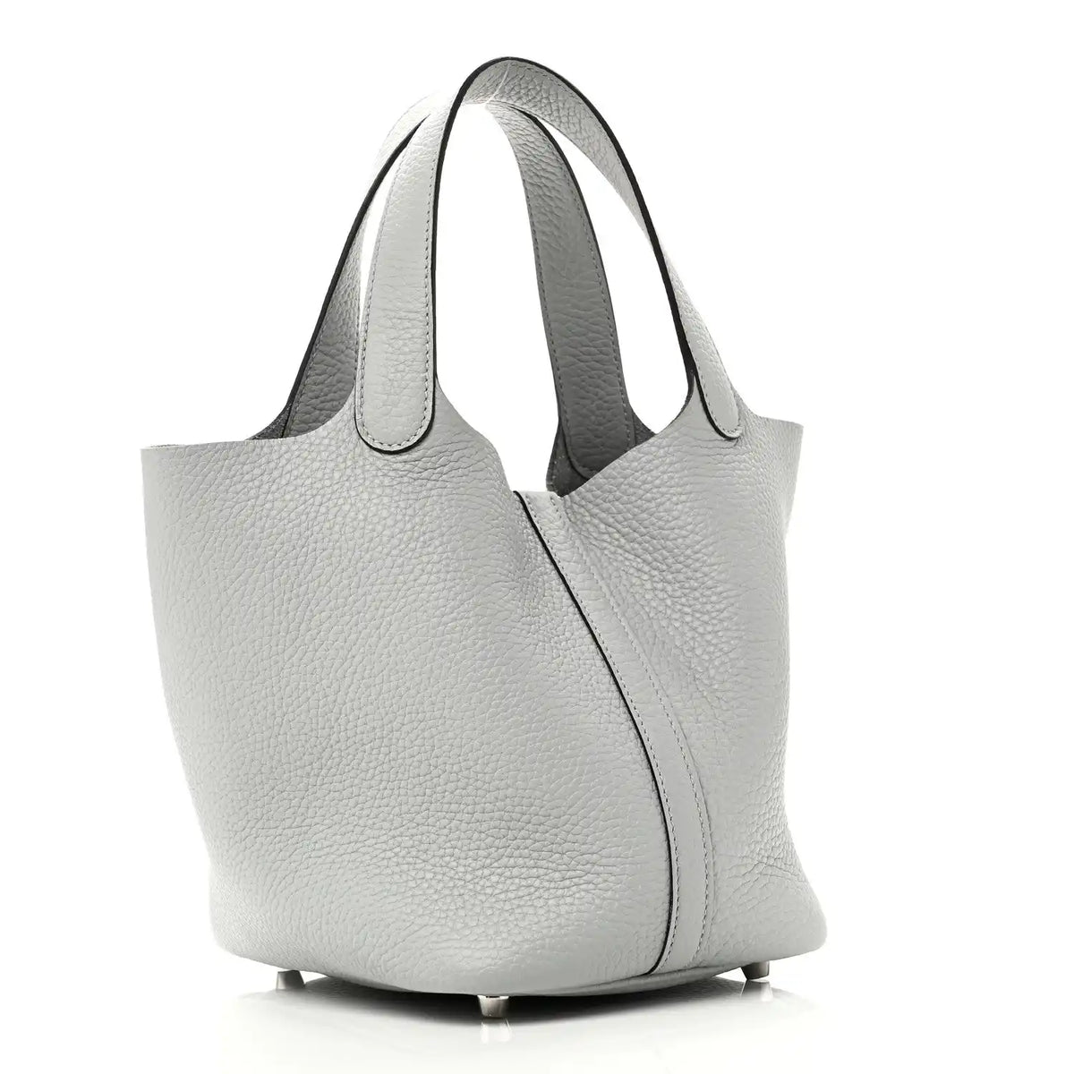 Light blue pebbled leather tote bag with curved side panel and top handles