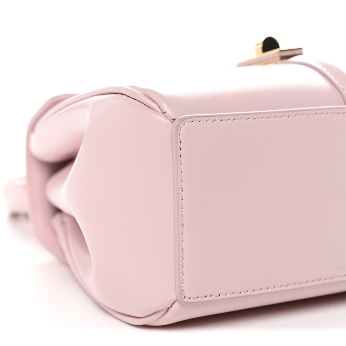 Pastel pink mini bag corner detail with rounded side and top handle base