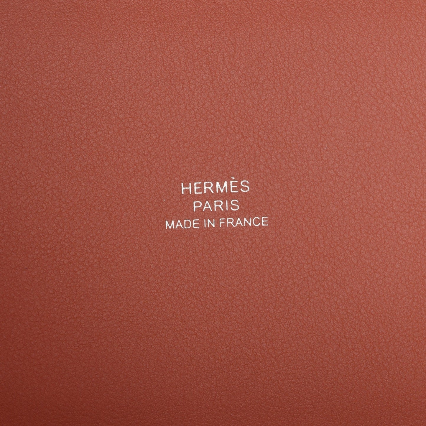 Leather bag branding text: HERMÈS PARIS MADE IN FRANCE
