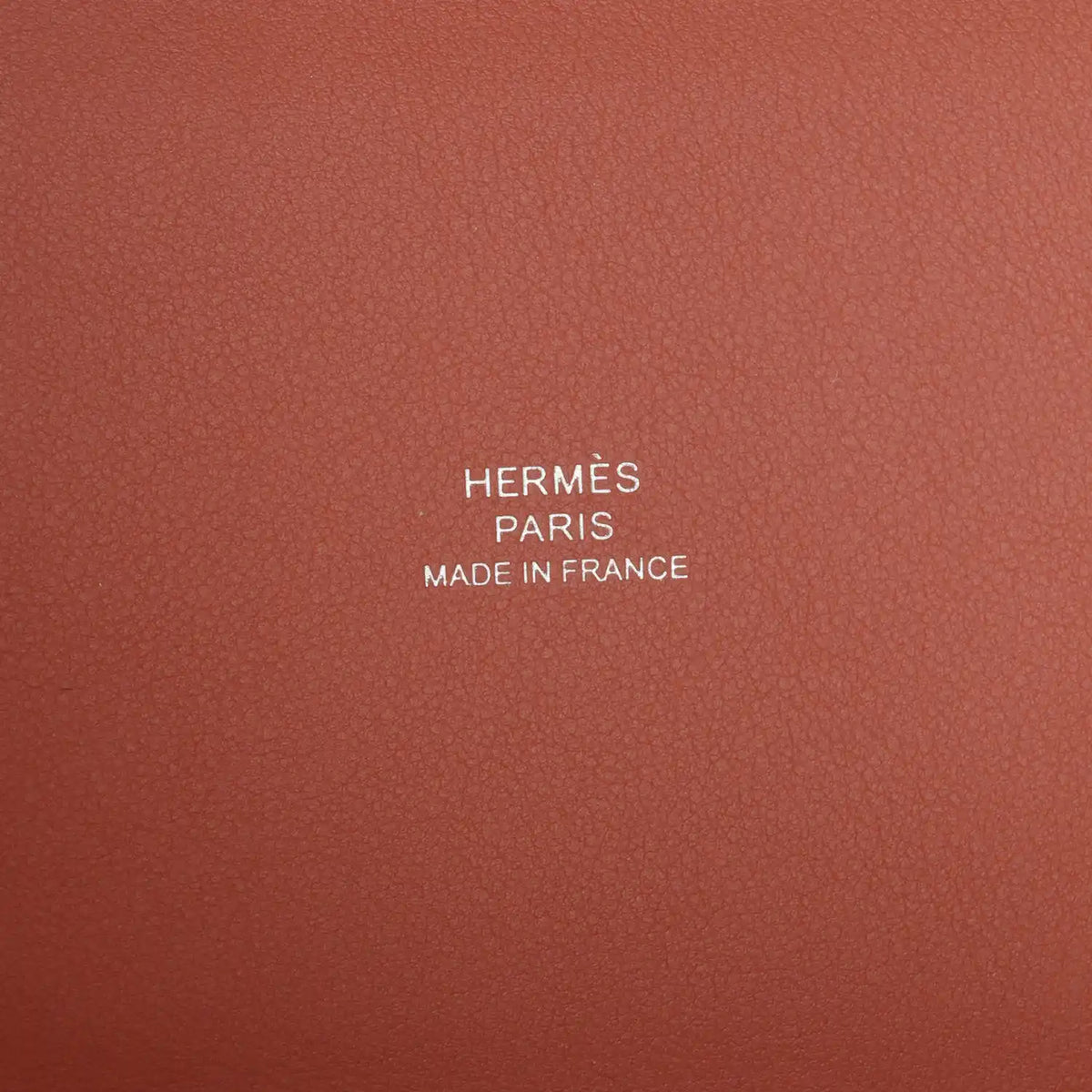 Leather bag branding text: HERMÈS PARIS MADE IN FRANCE