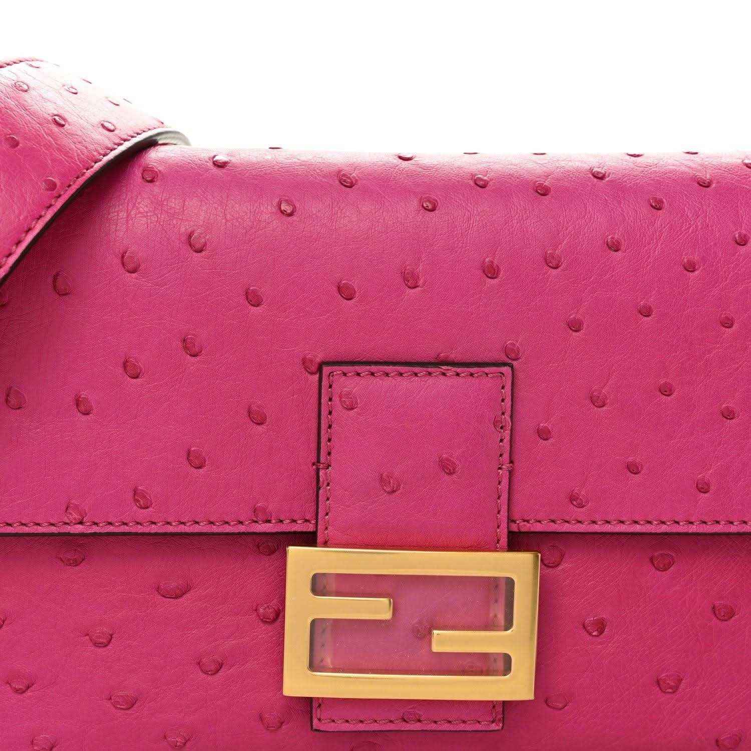 Pink ostrich leather flap with gold-tone F clasp and stitched trim