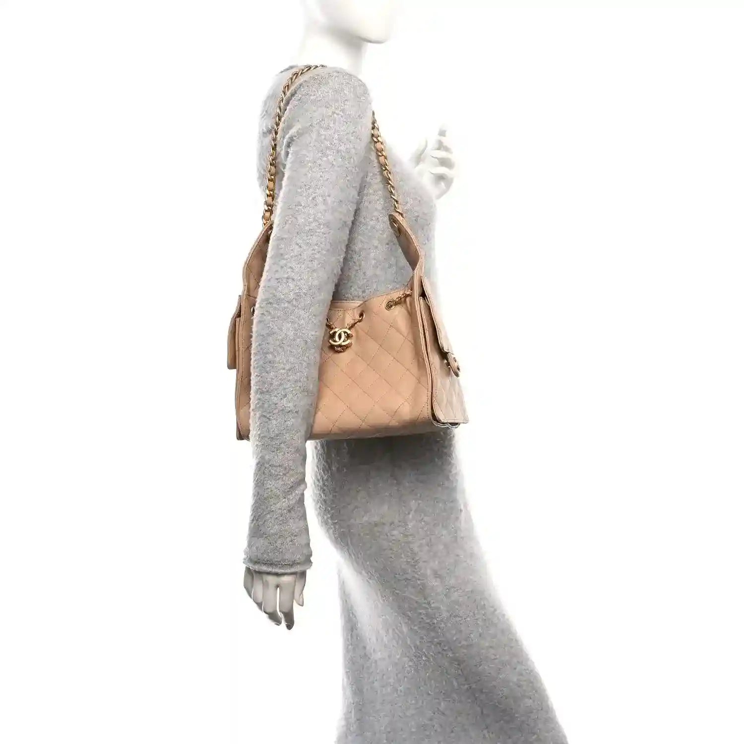 Chanel small quilted handbag in dark beige with chain handle and side flap pocket
